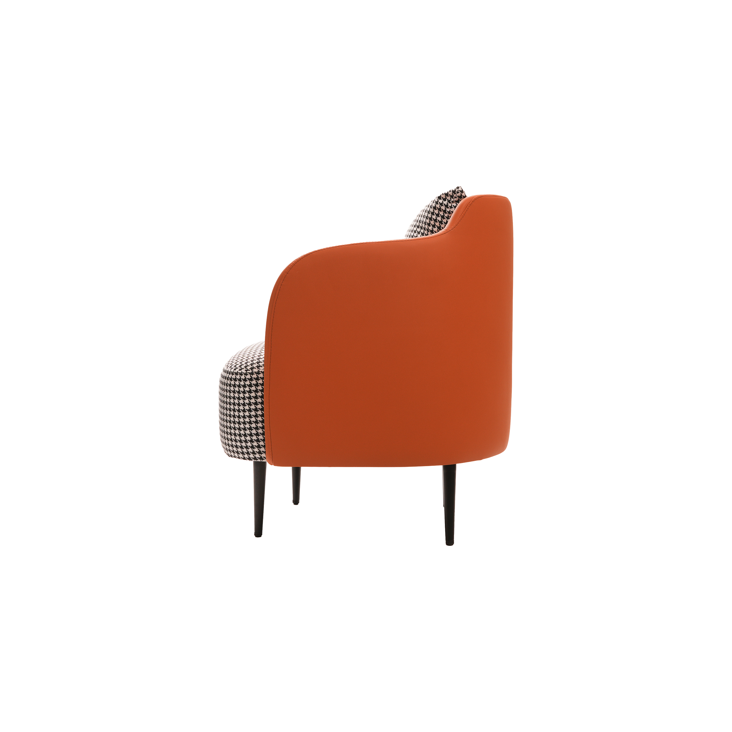 A stylish armchair with brown leather sides, black wooden legs, and houndstooth fabric on the seat and cushion, conveying a modern, cozy vibe.