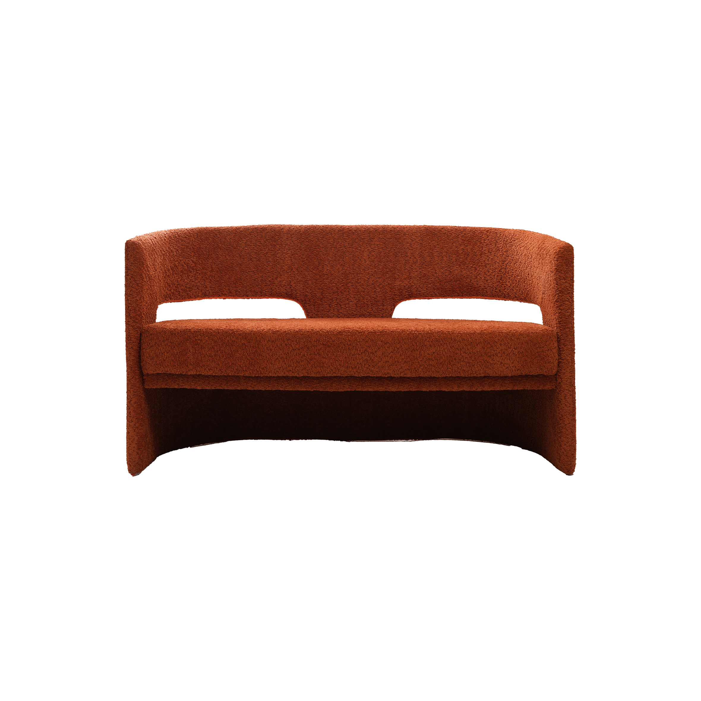 Modern curved rust-colored sofa with a sleek, minimalistic design and plush texture. The sofa's geometric cutouts add a contemporary and cozy feel.