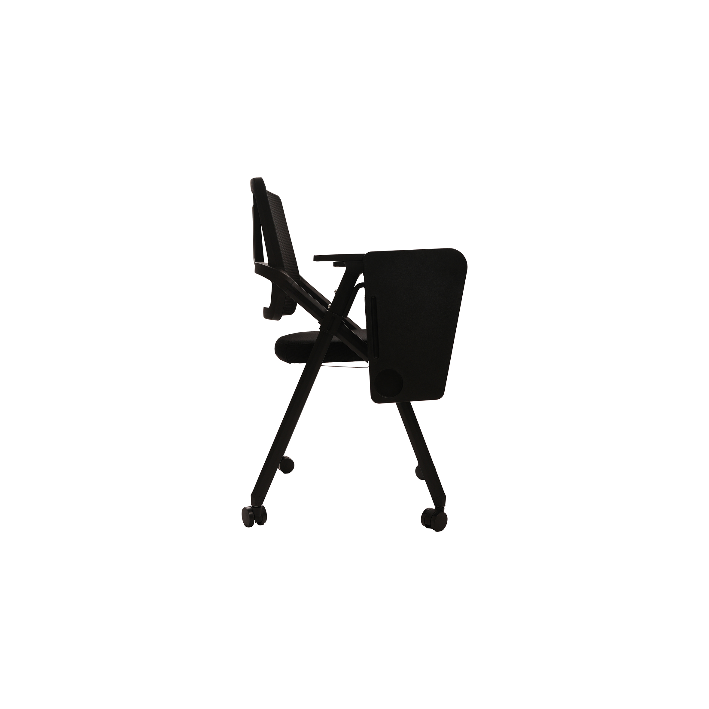 A black folding chair with wheels and a mesh backrest, featuring an attached foldable writing tablet on the left arm, set against a white background.