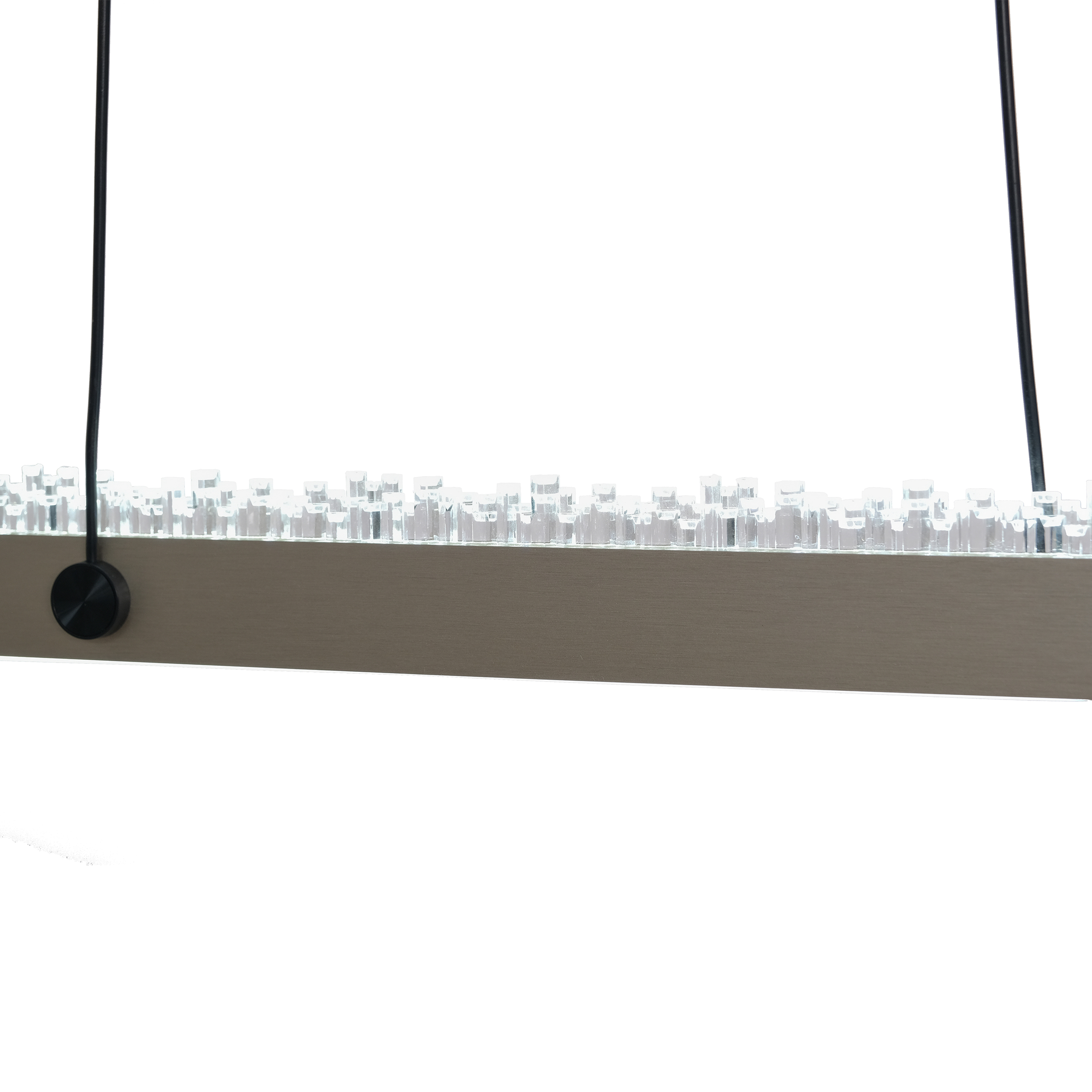 A sleek, horizontal LED light fixture with textured ice-like design on top, suspended by thin black cables against a white background, conveying a modern aesthetic.