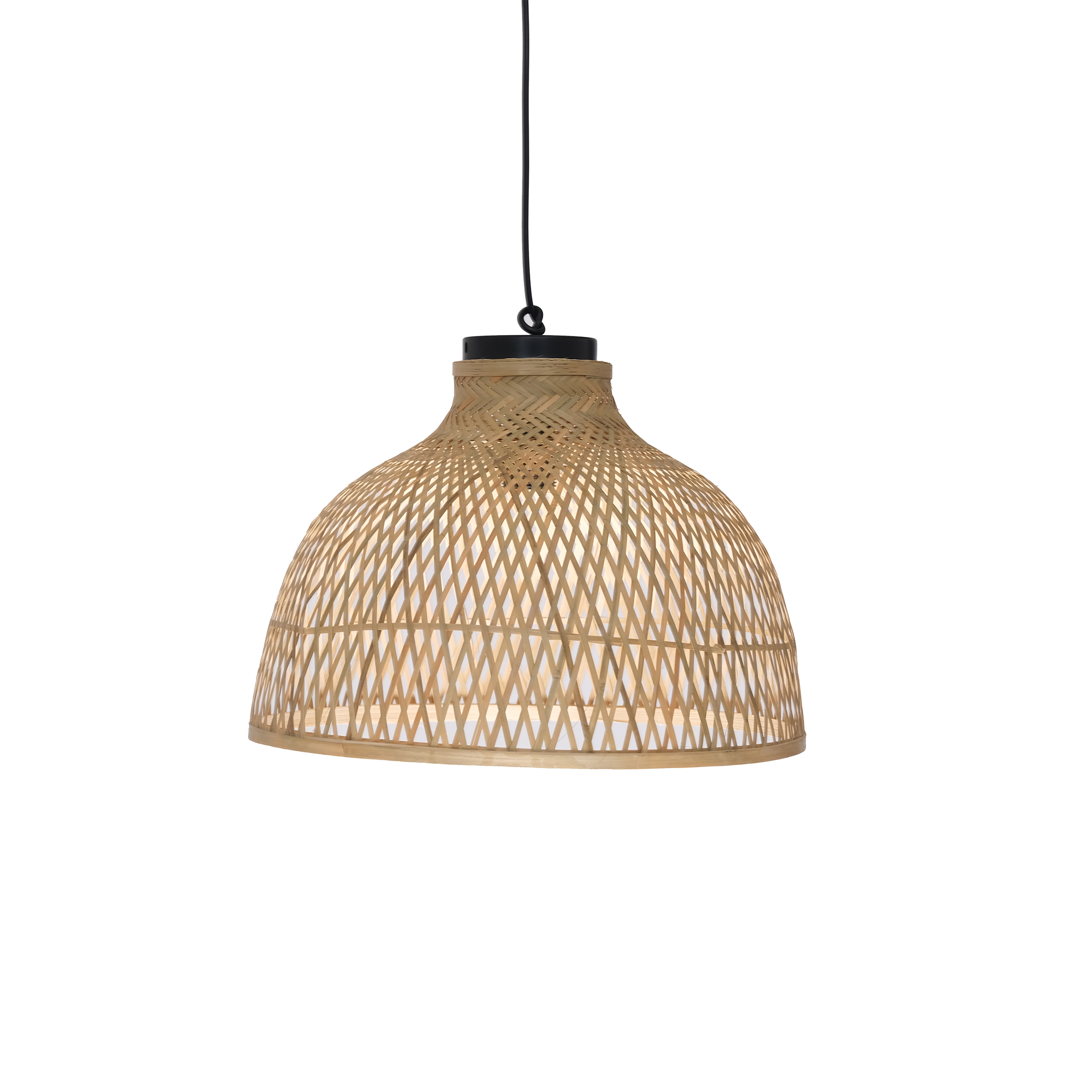 Woven rattan pendant lamp with a dome shape and black top, hanging from a black cord. Its warm light casts a cozy, patterned shadow.