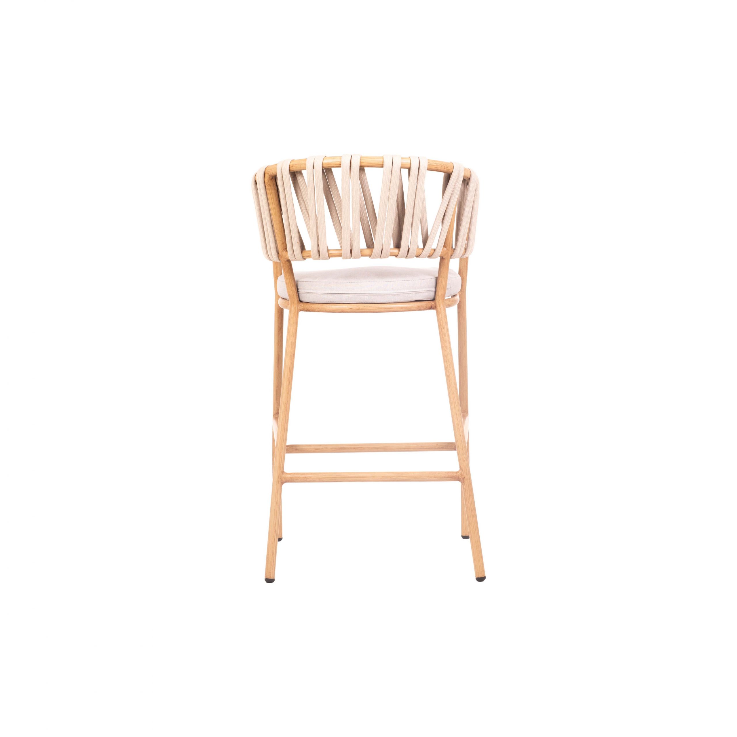 Natural wooden bar stool with a white cushioned seat and backrest. The back features a woven design with light-colored straps, creating a modern, stylish look.