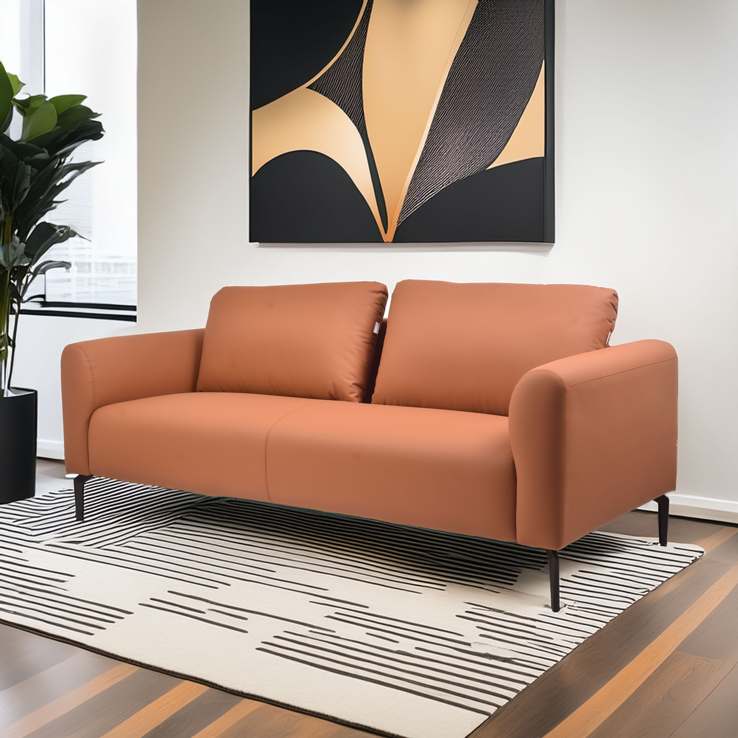 A modern living room with a terracotta sofa on a striped rug. A large abstract painting hangs above; a plant is near a window, creating a cozy vibe.